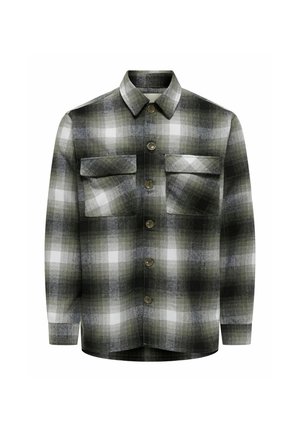 Koszula w kratę z krótkim rękawem w kolorze zielonym, czarnym i białym. Posiada dwie kieszenie na piersi, zapięcie na guziki z przodu i kołnierzyk. Miękka, teksturowana tkanina.