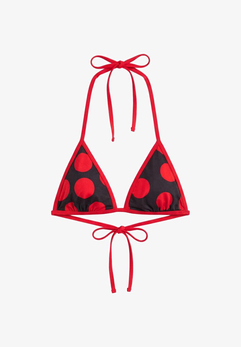 Haut de bikini triangle avec bordure rouge et liens, tissu noir avec grands pois rouges sur chaque bonnet, noué au cou et dans le dos.