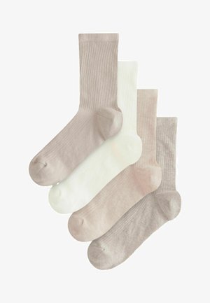 Set van vier geribbelde sokken in lichtbeige, crème en zachte roze tinten. Elke sok heeft een versterkte teen en een soepele textuur.