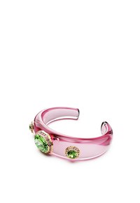 Translucent pink acrylic cuff bracelet featuring three green gemstones, two with gold accents and one with a pink stone border.