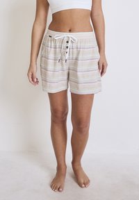 Lätta, randiga shorts i beige med rosa och gröna linjer, med dragsko i midjan och knappdetaljer, utformade för komfort.