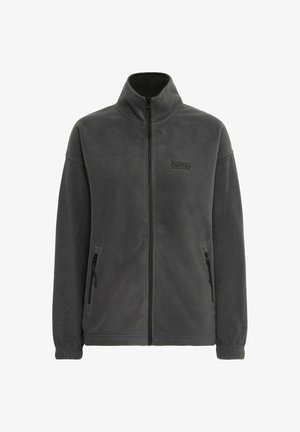 Grå fleecejakke med høy krage, full glidelås foran, to sidelommer med glidelås og en subtil logo på venstre bryst. Myk tekstur.