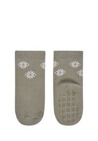 Grau Baumwollsocken mit weißen Schneeflockenmuster, ausgestattet mit strukturierten Grip-Sohlen und gerippten Bündchen für einen schlüssigen Sitz.