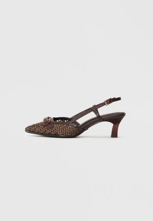Brown woven slingback heel with pointed toe, featuring a decorative buckle, slender straps, and a moderate heel height.