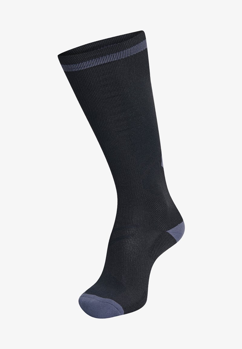 Svarta knähöga strumpor med ribbad textur; förstärkt häl och tå i mörkblått; enhetlig färg med ett kontrasterande smalt band högst upp.