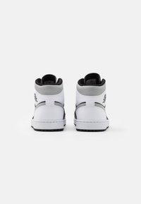 Jordan AIR JORDAN 1 MID - Sapatilhas de cano alto - black/light solar flare heather/white