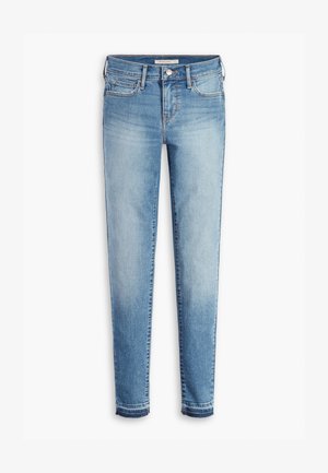 Lys blå denimjeans med slim fit, fem lommer, kontrasterende søm og lett slitt kant ved ankler.