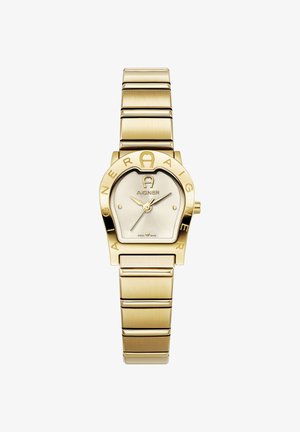 Montre dorée avec boîtier arrondi et bracelet à maillons. Cadran à fond argenté, aiguilles dorées, nom de la marque en relief. Fabriquée en Suisse.