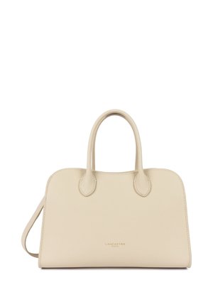 Sac à main en cuir beige avec deux anses et une bandoulière, présentant un design minimaliste et le logo "LANCASTER PARIS" en lettres dorées.