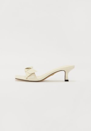 ERMA - Heeled mules - white/bone