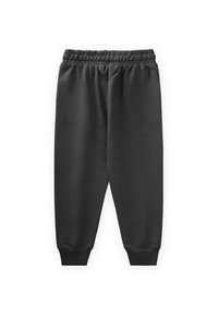 Čierne joggingové nohavice s elastickým pásom, s užšími manžetami a hladkým povrchom. Dizajn je jednoduchý a funkčný, bez ďalších detailov.