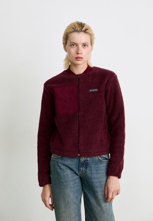 Burgundy fleece jacket with a zip front, features a textured design, a contrasting maroon pocket, and a logo label on the chest.