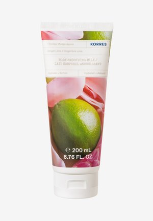 Tubetto di latte per il corpo KORRES, con una grafica di lime verde, accenti di fiori rosa, tappo bianco e etichettatura chiara. Capacità di 200 mL.