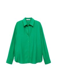 Chemise verte à manches longues avec col et larges poignets, étalée à plat sur un fond blanc.