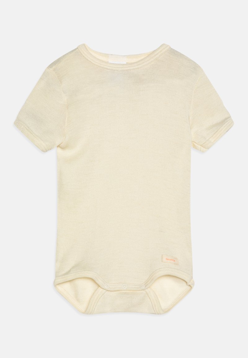 Body à manches courtes en crème clair, texture côtelée, encolure ronde et fermeture à boutons au bas. Présente une petite étiquette de marque.