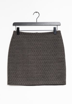 Dark gray knee-length skirt with a subtle herringbone pattern hanging on black clip hanger against white background.