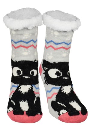Pantofole accoglienti con suole rosa, motivi a zigzag grigi e bianchi e disegni di gatti in bianco e nero in stile cartone animato sul davanti e sui lati.