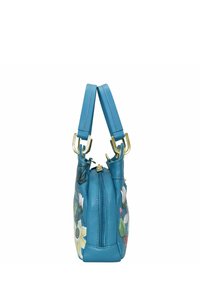 Teal leren handtas met bloemborduursel. Voorzien van een ritssluiting, twee korte handvatten en gouden hardware accenten. Glad textuur.
