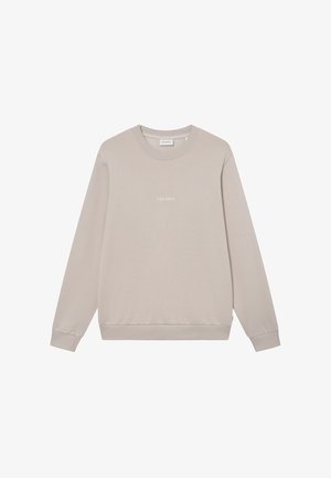 Light beige sweatshirt with a round neckline and long sleeves. Features a ribbed hem and cuffs, with "LES DEUX" logo embroidered in white.