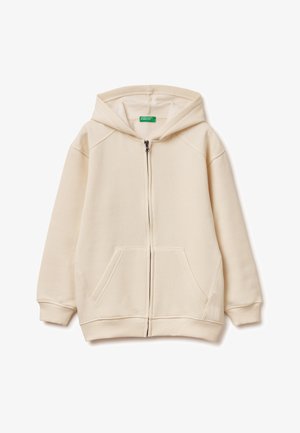 Felpa con zip di colore beige chiaro realizzata in un tessuto morbido. Presenta un grande cappuccio, due tasche frontali, polsini a coste e una zip liscia.