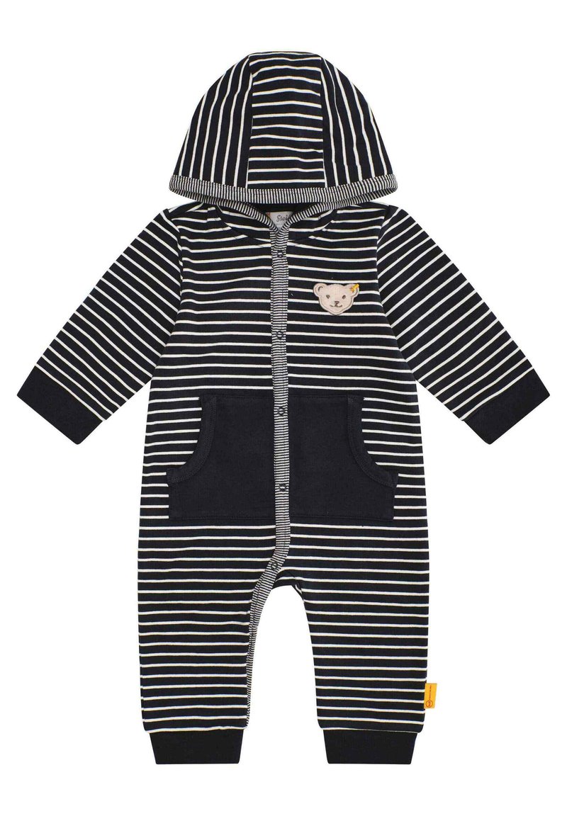 Gestreifter Kapuzen-Overall in Marineblau und Weiß, mit einem Bärenpatch, zwei Fronttaschen und gerippten Bündchen für eine bequeme Passform. Aus weichem Baumwollmaterial.