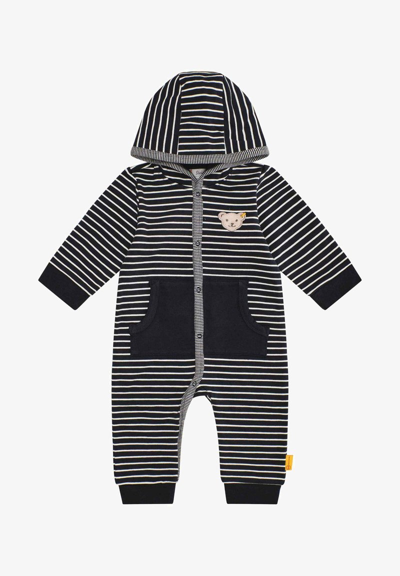 Gestreifter Kapuzen-Overall in Marineblau und Weiß, mit einem Bärenpatch, zwei Fronttaschen und gerippten Bündchen für eine bequeme Passform. Aus weichem Baumwollmaterial.