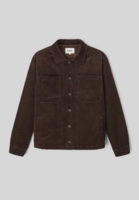 Veste en velours côtelé marron avec un col, deux poches avant et des boutons de fermeture, à coupe droite et en tissu texturé.
