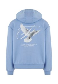Felpa blu chiaro con una stampa grafica di una colomba e la scritta "LA FEDE È FORZA RIMANI VERITÀ" sul retro. Tessuto morbido, vestibilità ampia.