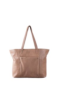 Leather tote bag in a soft beige color, featuring smooth texture, long handles, and a front pocket with metal studs.