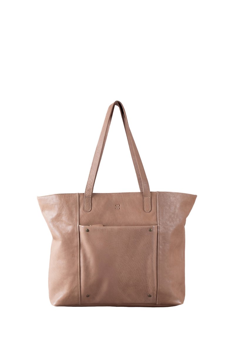 Leather tote bag in a soft beige color, featuring smooth texture, long handles, and a front pocket with metal studs.
