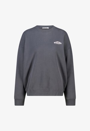 Dark gray sweatshirt with a loose fit, ribbed cuffs, and a crew neck. Features white "MATCHA BREAK" text on the chest. Soft cotton material.