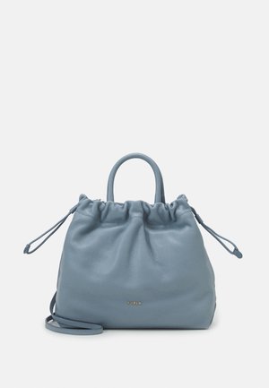 Blue leather drawstring bag with a gathered top, dual handles, and a detachable shoulder strap. Features a subtle logo on the front.
