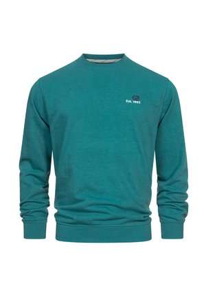 Teal genser, rund hals, lange ermer, ribbede mansjetter og kant. Har hvit logo med "Est. 1993" på brystet. Glatt bomullsstoff.