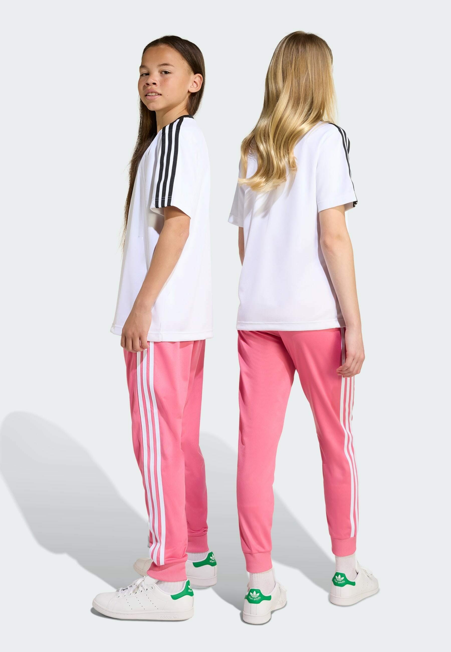 adidas Originals SUPERSTAR - Tracksuit bottoms - pink fusion/pink