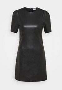 Robe en cuir noir avec manches courtes bouffantes, encolure ronde et détails de coutures subtilement travaillés, conçue pour une silhouette cintrée. Fermeture éclair au dos.