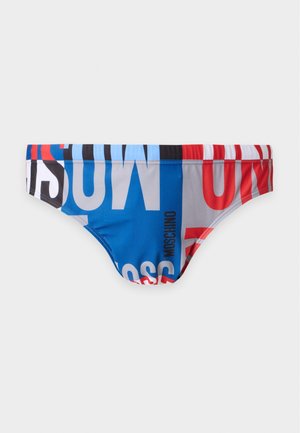 Slips de bain pour homme avec des blocs de couleurs bleu, rouge, noir, blanc et gris vifs et un grand texte superposé de la marque Moschino.