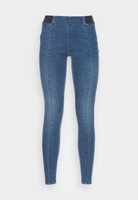 Jeans ajustados en denim de color azul oscuro, con una cinturilla elástica negra, una textura suave y un diseño ceñido con costuras laterales.