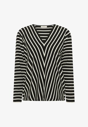 Fekete-fehér csíkos hosszú ujjú felső, elülső részén átlós csíkokkal, ujjain vízszintes csíkokkal, V-nyakú gallérral.