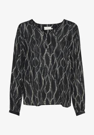 Svart långärmad topp med ett texturerat mönster i vitt som liknar sammanflätade linjer. Enkel rund halsringning, avslappnad passform och manschetter på ärmarna.