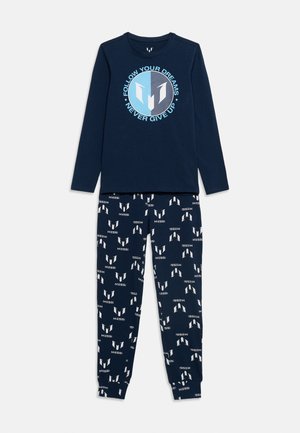 Haut à manches longues bleu marine avec le texte « Suis tes rêves, n'abandonne jamais » et un emblème, assorti à un pantalon à motif avec le logo de Messi.