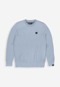 Light blue knitted sweater with a textured pattern, round neckline, and black logo patch on the chest. Ribbed cuffs and hem.