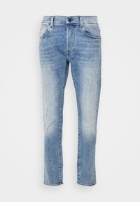 Ljust blå denimjeans med rak passform, med en sliten detalj fram, fem fickor och gylfsstängning.