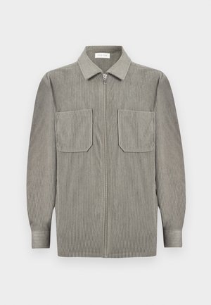 Hellgraue, gerippte Cord-Hemdjacke mit Kragen, Frontreißverschluss, langen Ärmeln, knöpfbaren Manschetten und zwei Brusttaschen.
