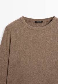 Brown long-sleeve shirt made of soft fabric with a round neck. Features a plain design and subtle texture. Label: Massimo Dutti.