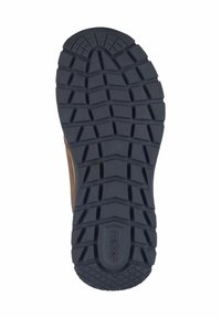 Mörk gummisul med ett strukturmönster för grepp, med en lågprofildesign och en rund klack. Varumärkeslogotyp synlig.