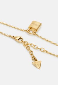 Guess KEEP ME CLOSE - Kaulakoru - yellow gold-coloured