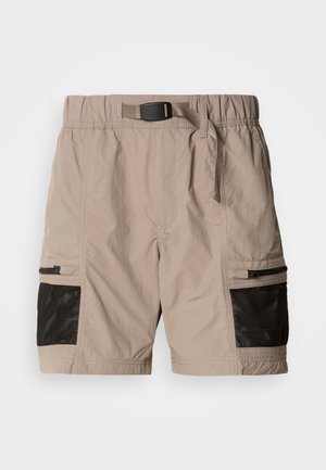 Beige cargoshorts van een gestructureerde stof, met zwarte gaasaccenten, een elastische tailleband en zijzakken met ritsen.