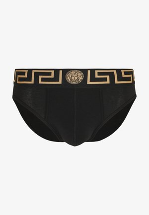 Black cotton briefs with a gold geometric patterned waistband featuring a central Medusa emblem. Seamless design with straight cut.