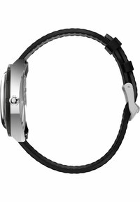 Orologio con cinturino in gomma nera e una grande cassa in acciaio inossidabile con finitura silver-tone, quadrante rotondo, corona laterale e dettagli testurizzati sul cinturino.