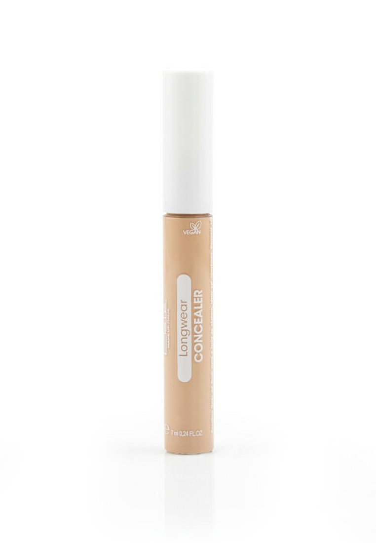 Correttore a lunga tenuta in un tubo di plastica con un cappuccio bianco. Colore beige con un'etichetta semplice in bianco. Design elegante e cilindrico. 7 ml.